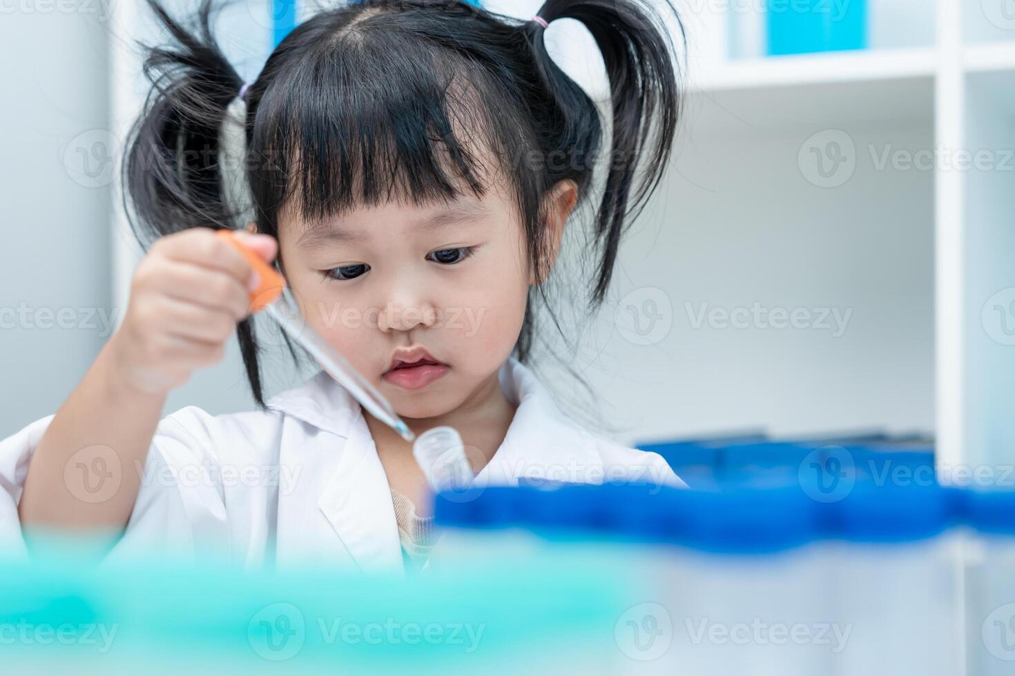 education scientific in laboratory. Medical child learning, Biotechnology, discover, imagine, executive function, kid, education, intelligence quotient, emotional quotient. photo