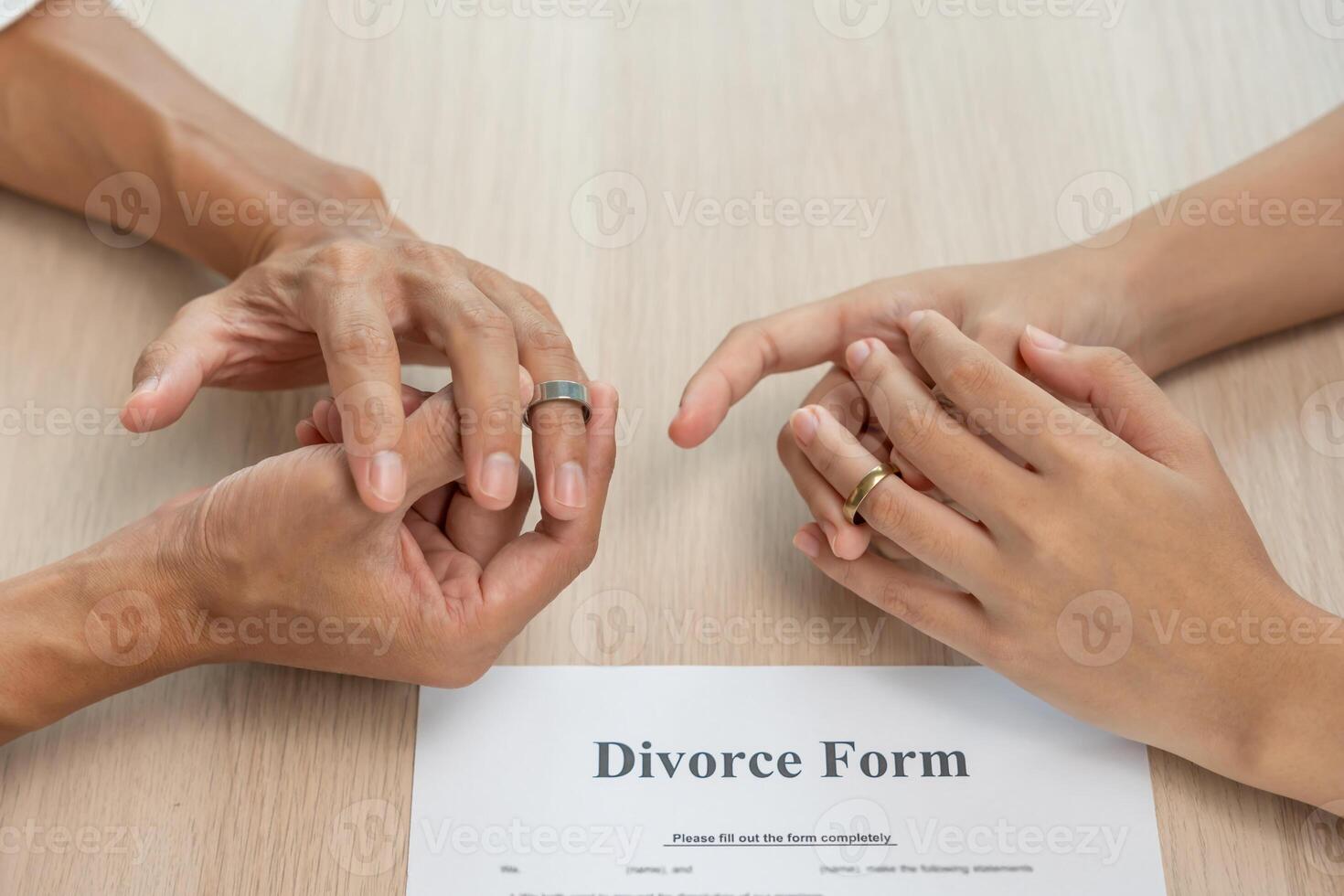 Quarrel, Divorce. husband and wife remove married ring. Couples desperate and disappoint after marriage. Divorce document, upset and frustrated after conflict. distrust, love problems. photo