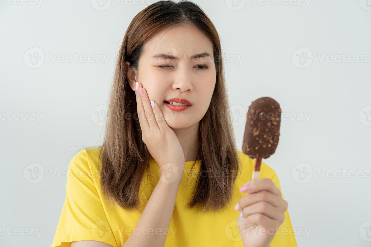 sensitive teeth after eating ice cream, female suffer tooth, decay problems, dental care, tooth extraction, decay problem, bad breath, Gingival Recession, Oral Hygiene instruction photo
