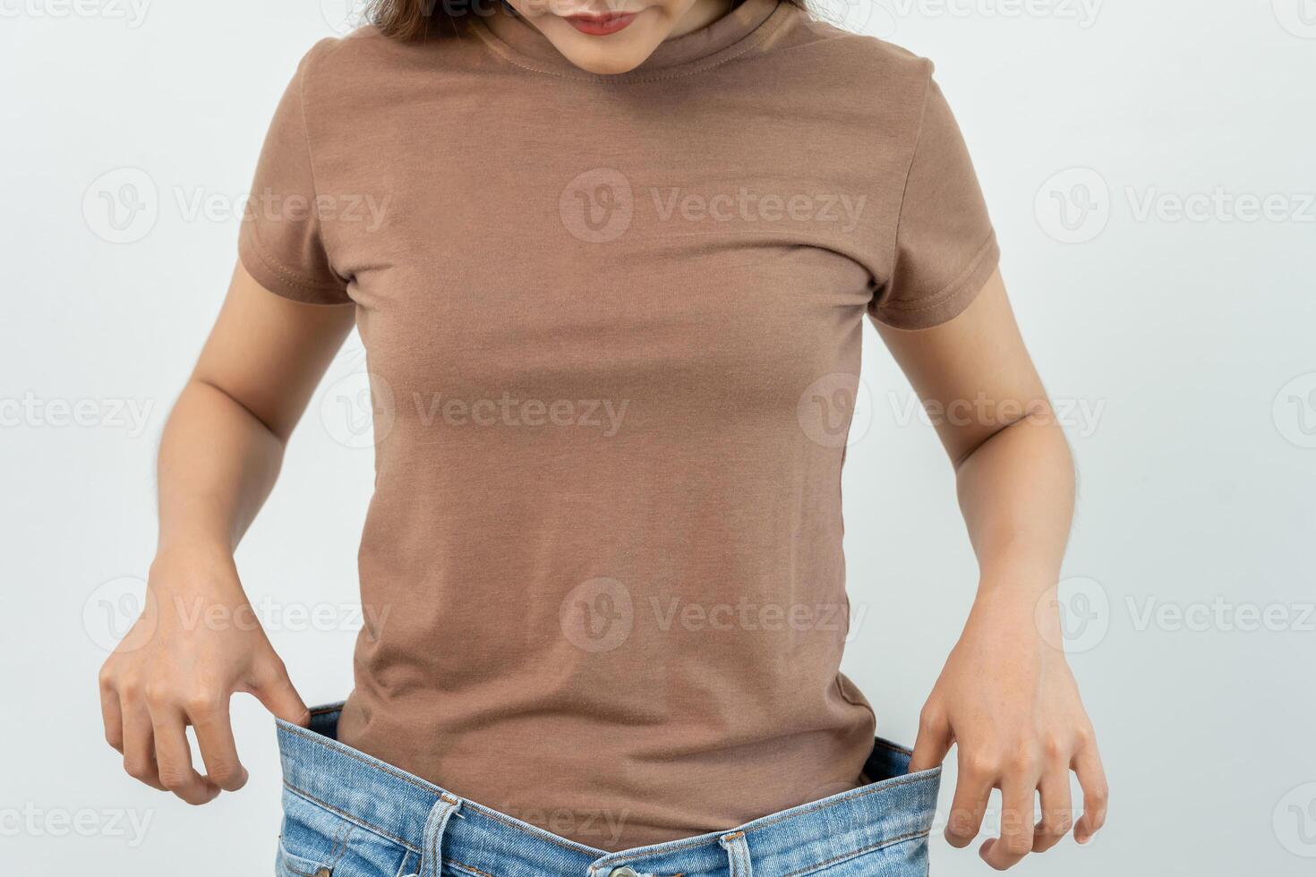 results of diet. Beautiful shape. female have a reduced waist size after under going a weight loss corse. can not wear jeans due to weight loss. balance, control, routines, exercise. photo