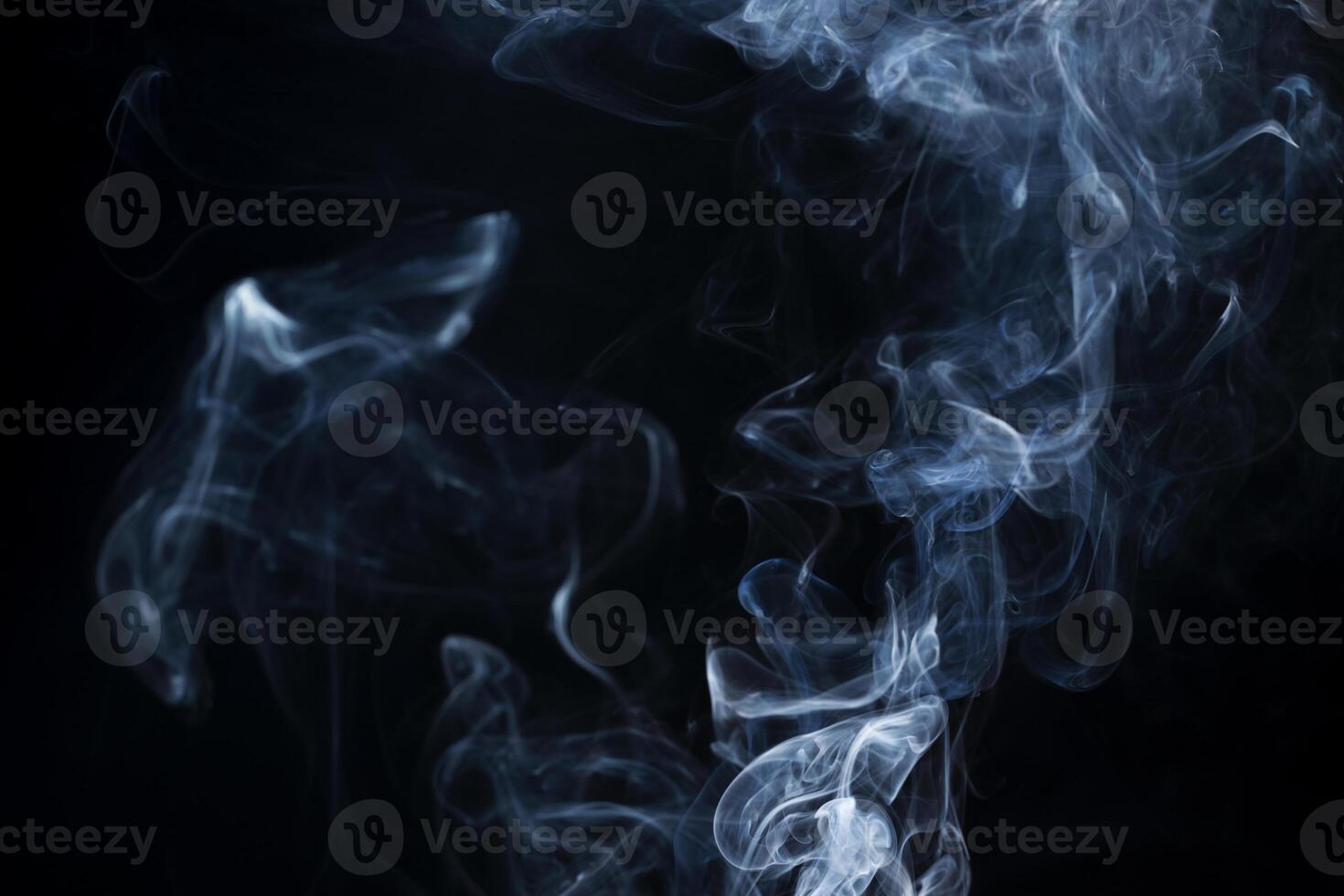 Smoke from flames or fog clouds graphic design art isolated on dark black background photo