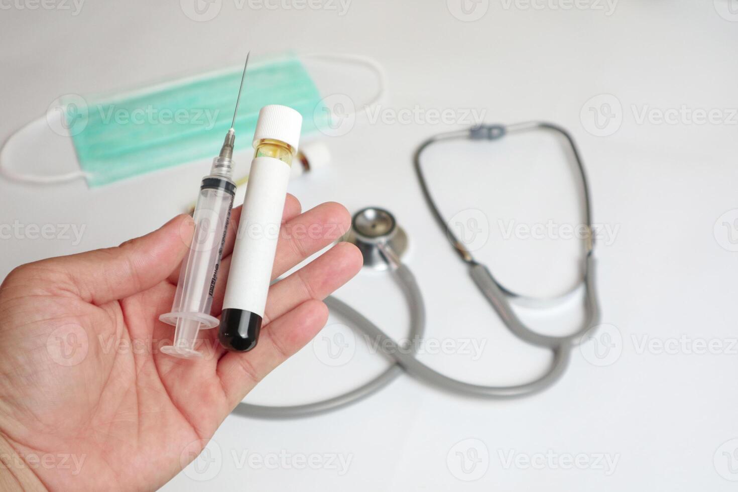 the 'BLOOD' concept of blood samples in the test tube, the droplets of the injection tip end photo