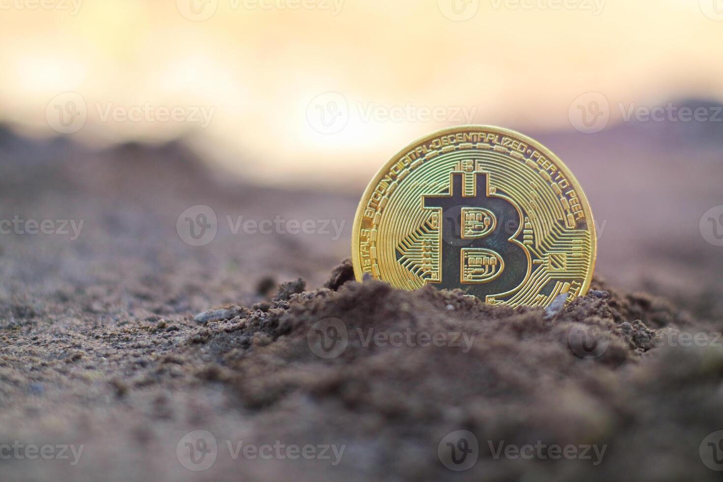Bitcoin Golden on ground soil deep with light Virtual cryptocurrency bitcoin mining concept. photo