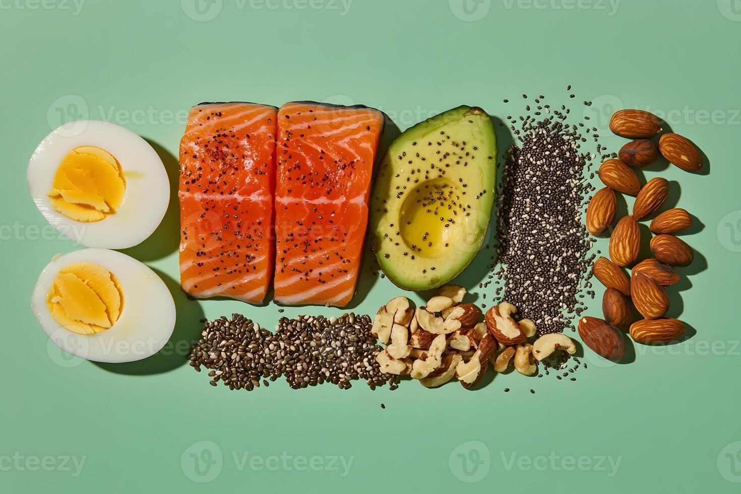 Healthy Food Flatlay Photography Green Background Salmon Avocado Eggs Nuts Chia Seeds photo