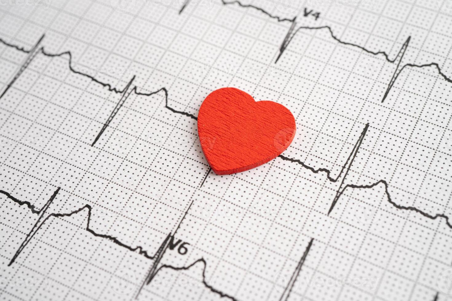 Red heart on electrocardiogram ECG with red heart, heart wave, heart attack photo