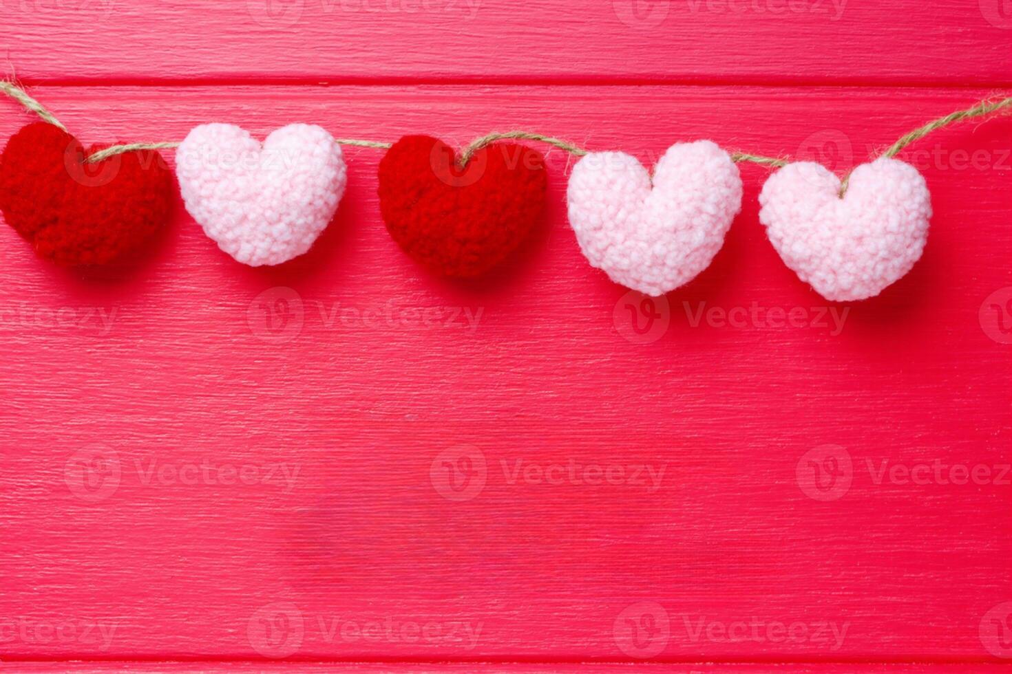 Romantic Valentine Day Scene with Red Heart Ornaments photo