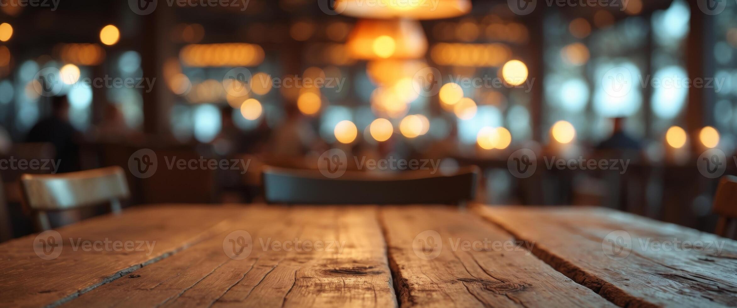 Rustic Wooden Tabletop with Blurred Restaurant Ambiance and Warm Lighting for a Cozy Dining Experience photo