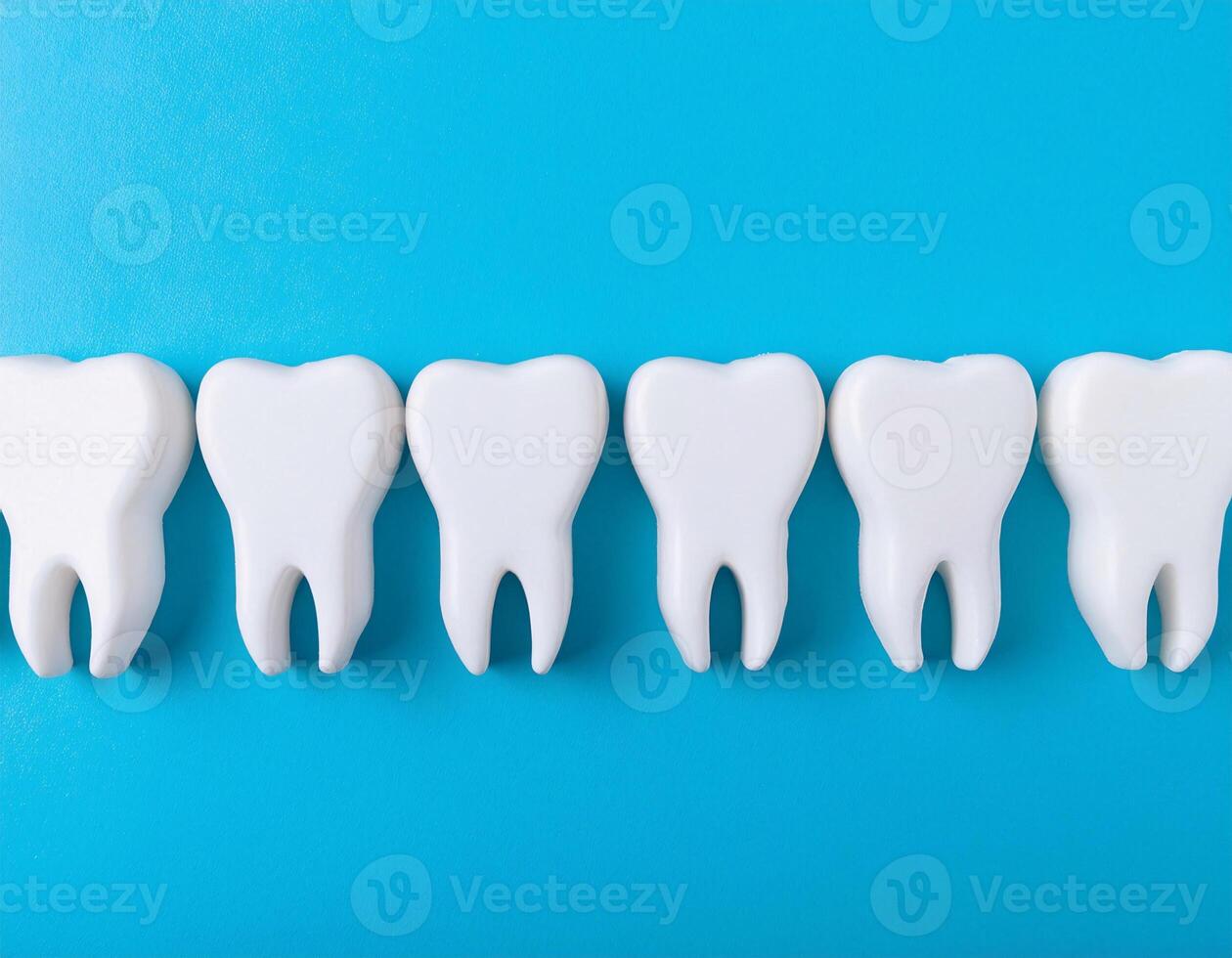 Playful Dental Banner Featuring Toy Teeth on Blue Backdrop with Copy Space photo