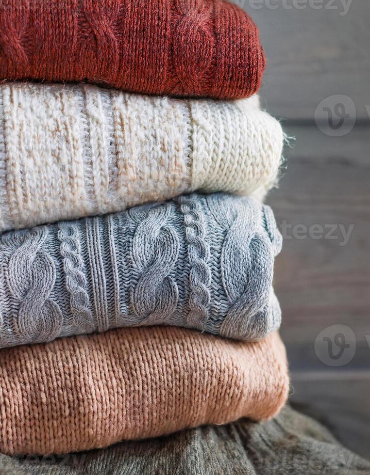 Soft and Cozy Close-Up of Winter Sweaters and Pullovers Ready for the Cold photo