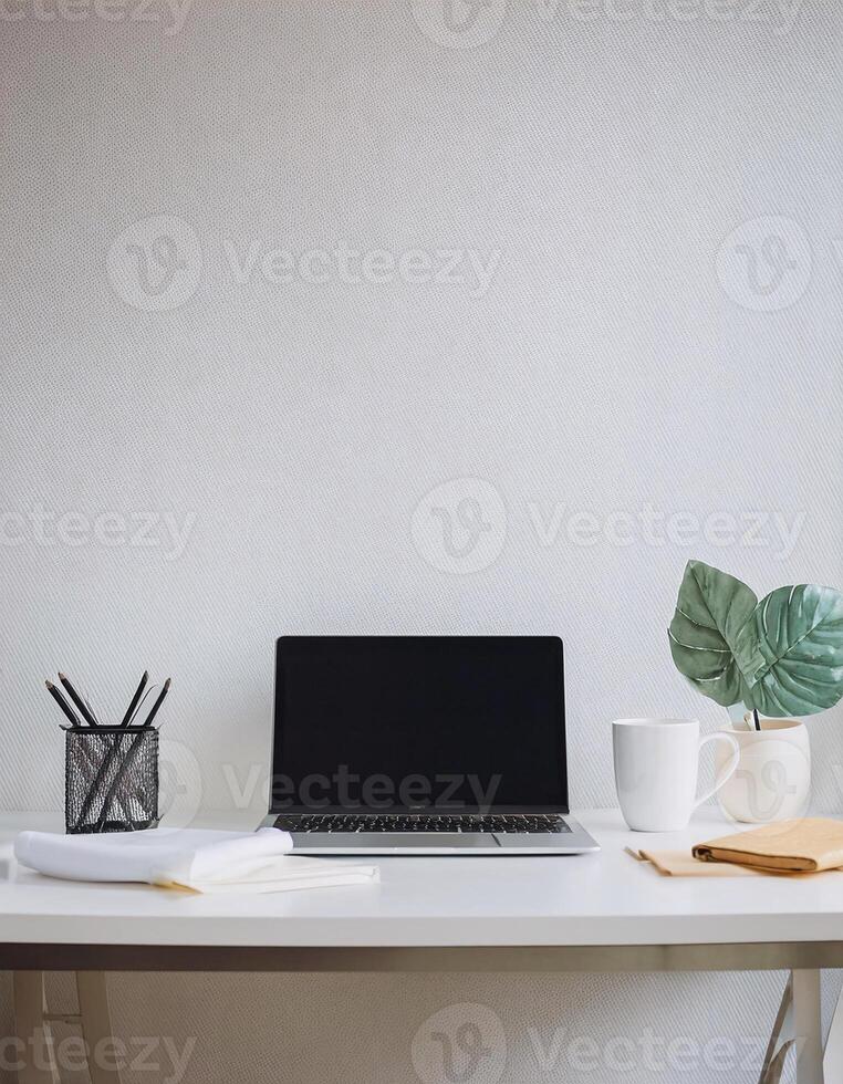 Efficient Home Office Desk with Laptop, Coffee, and Paperwork photo