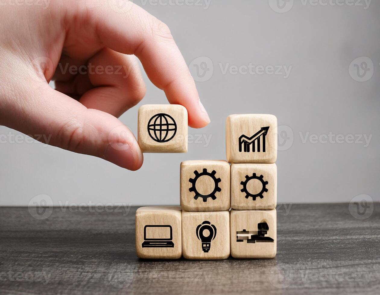 Creative Business Ideas on Grey Table with Wooden Blocks and Icons photo
