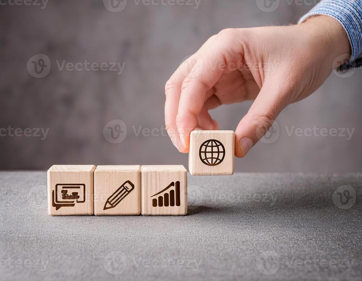 Strategic Business Planning with Wooden Cubes and Icons on Grey Surface photo