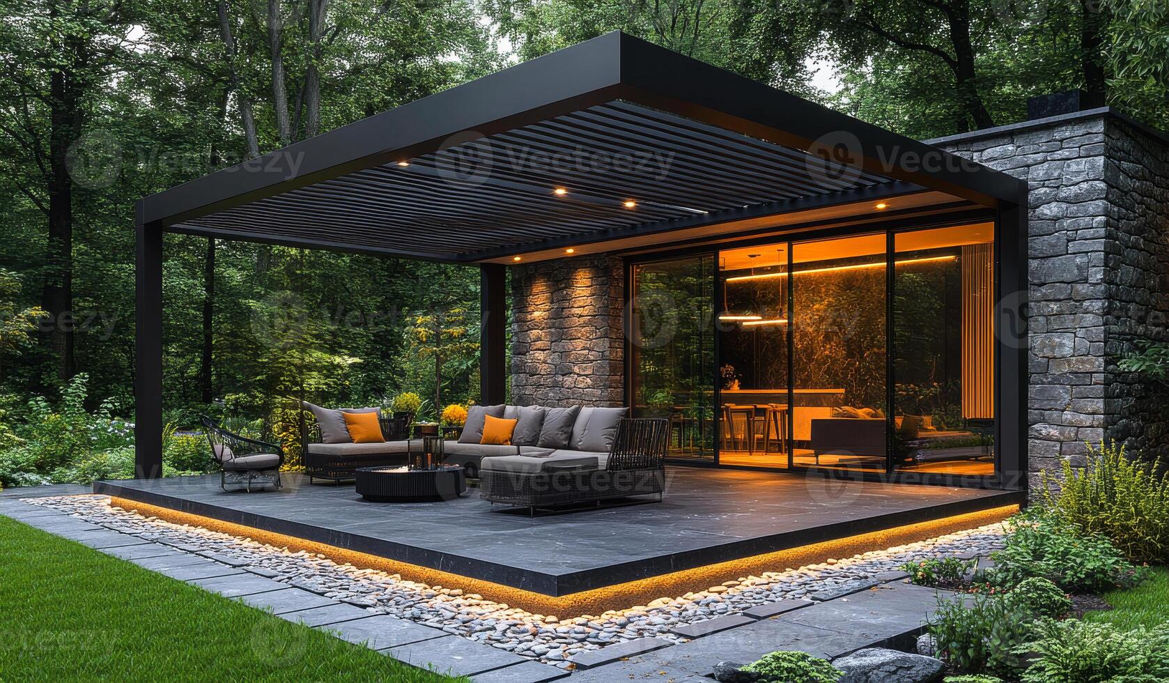Elegant modern outdoor space. A sleek outdoor area features comfortable seating and stylish lighting, surrounded by lush greenery and stone accents. photo