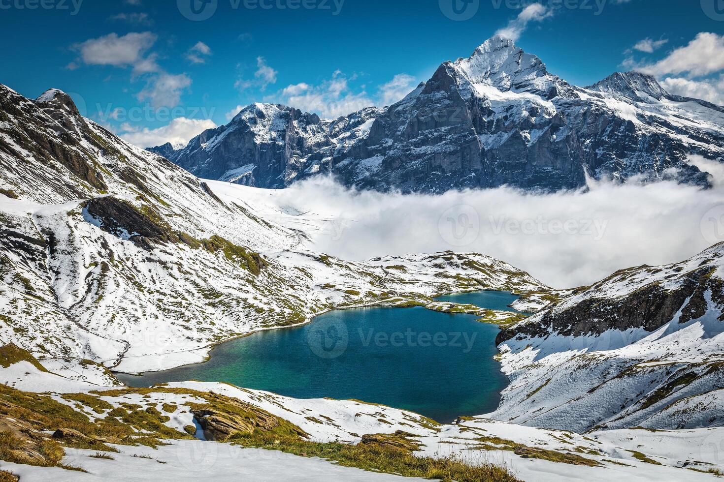 Bachalpsee lake and beautiful snowy mountains in background, Grindelwald, Switzerland photo