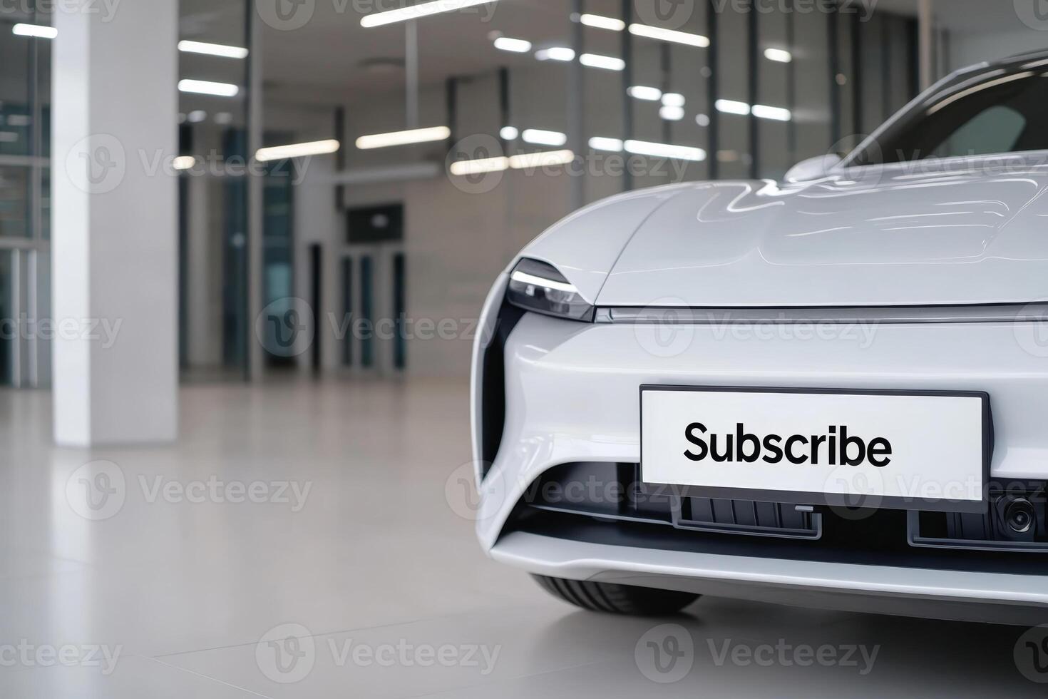 Modern electric car interior showcasing sleek design and subscription sign in a spacious dealership during daylight hours photo