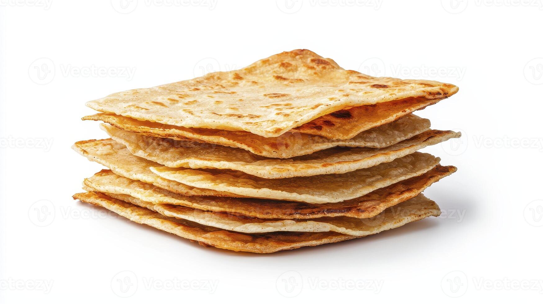 Stack of golden-brown flatbreads with crispy texture displayed against a clean white background for culinary presentation photo
