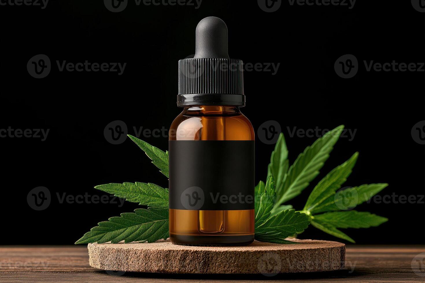 A stylish amber dropper bottle surrounded by vibrant green leaves on a wooden base. photo