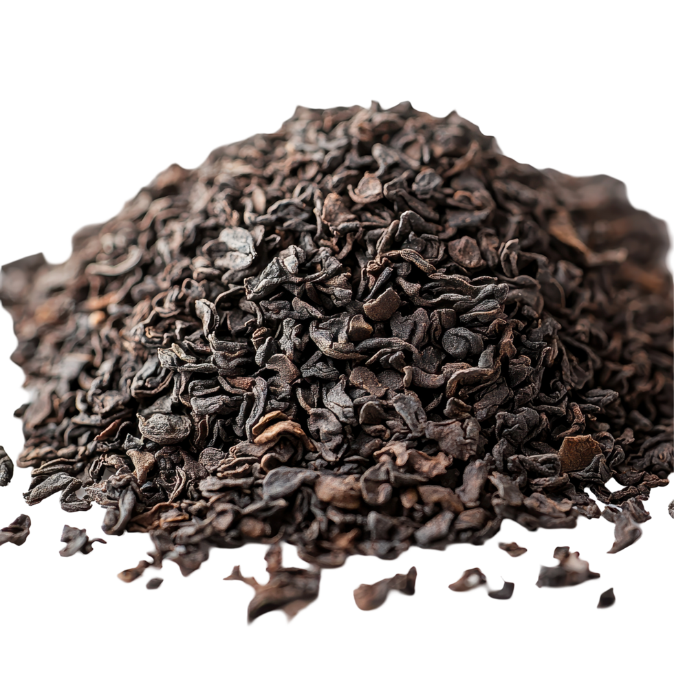 Close-up view of loose black tea leaves on a white background with texture and color details highlighted isolated on transparent background png