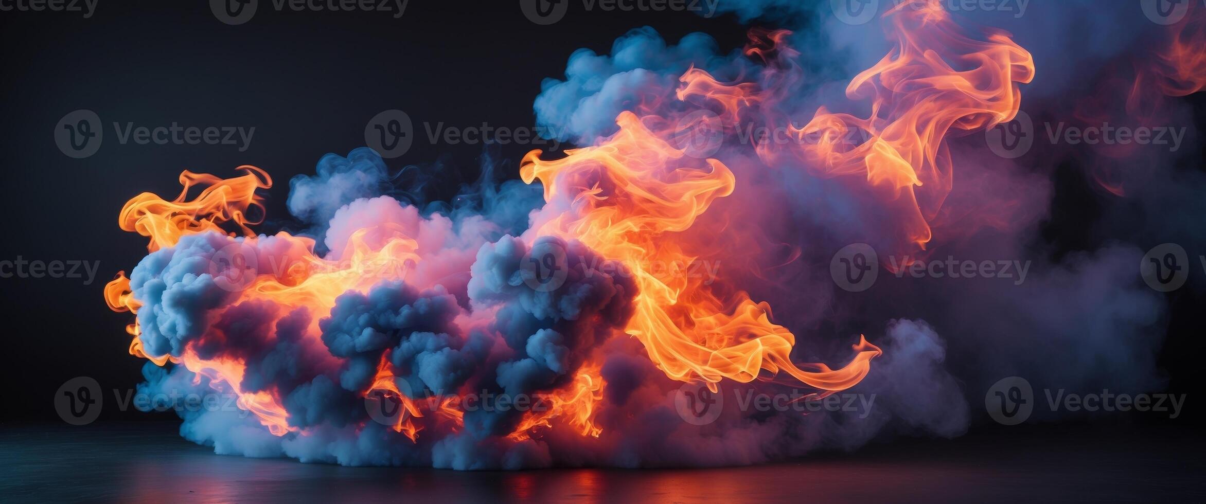 Captivating fire of colorful smoke isolate on black background photo