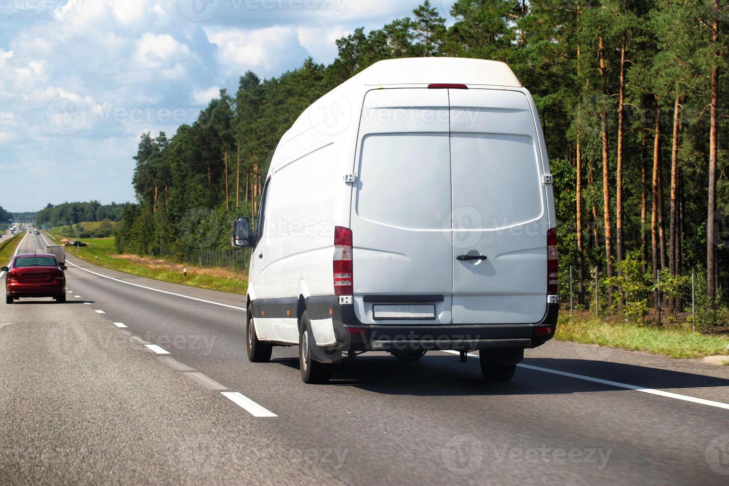 White cargo minibus transports household products, high delivery speed and low cost, industry. Copy space for text photo