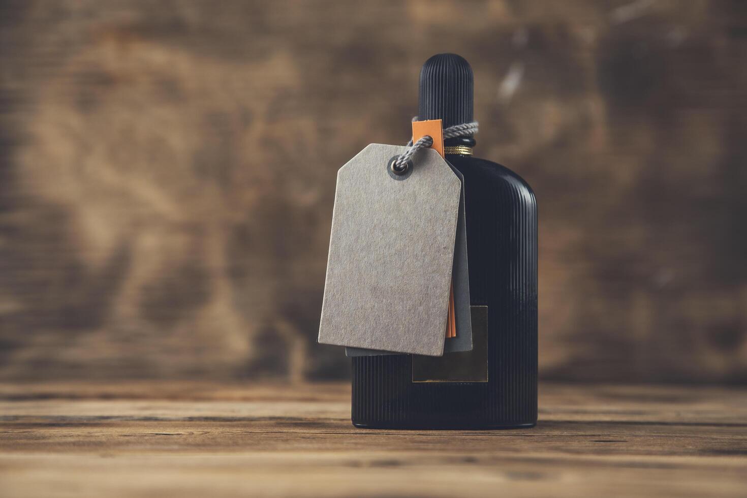 A bottle of whiskey with a tag on the side photo