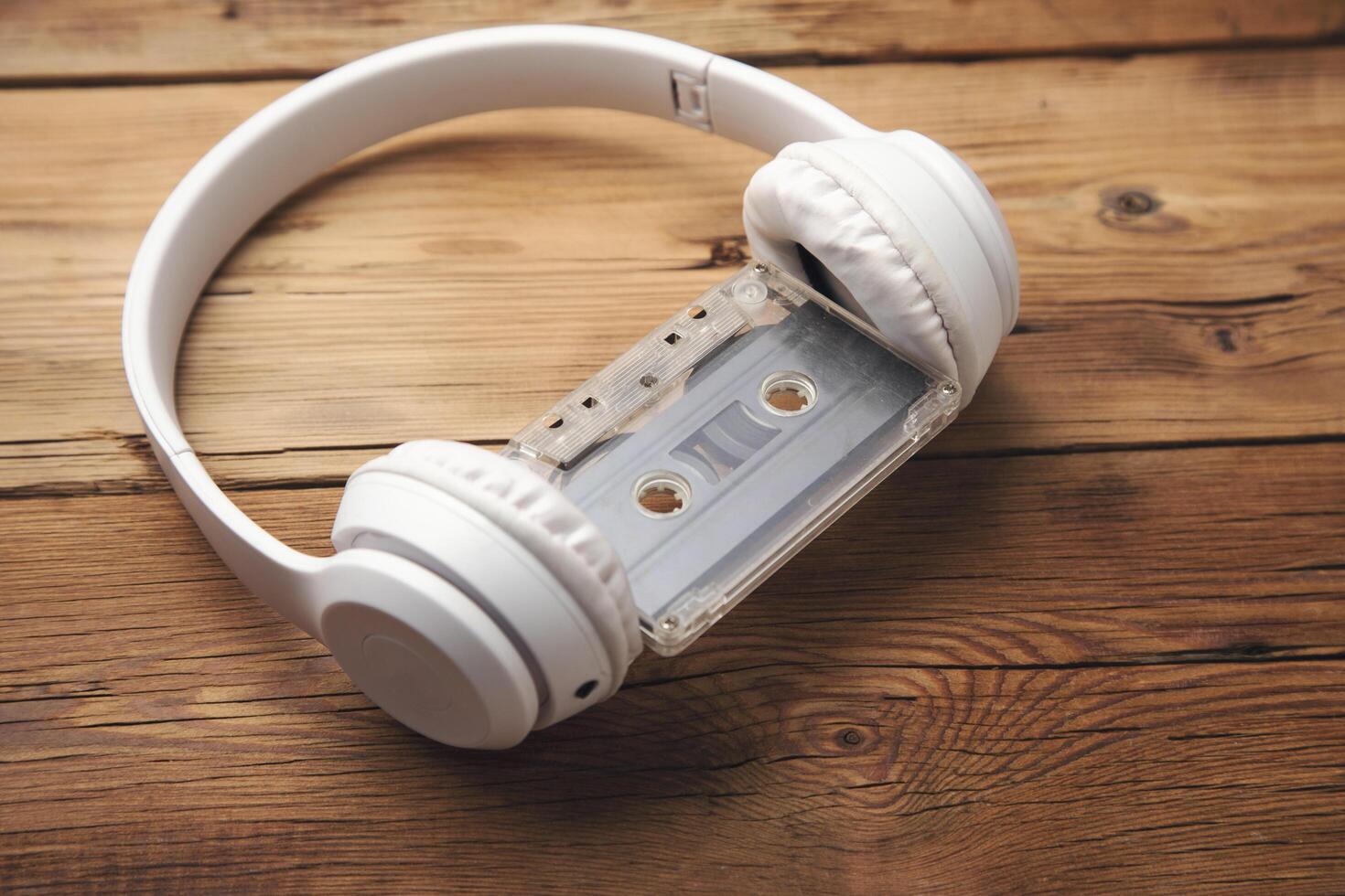 earphone and cassette on table photo