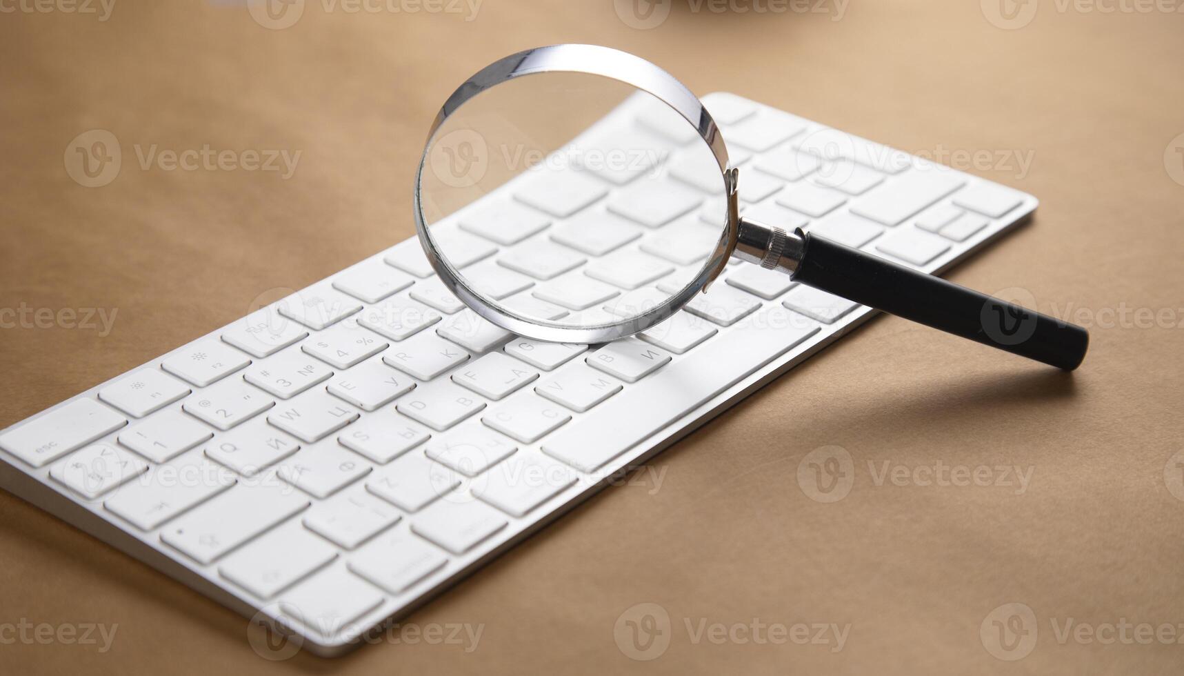 magnifier on the computer keyboard, photo