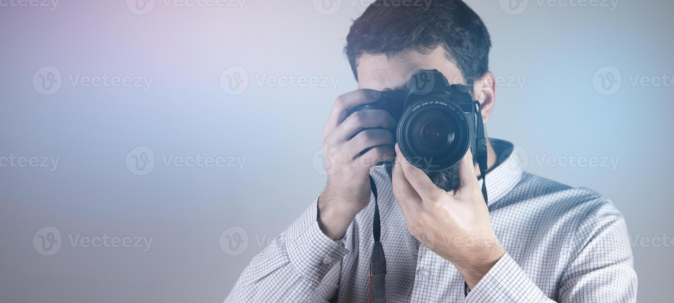 photographer man hand holding camera photo