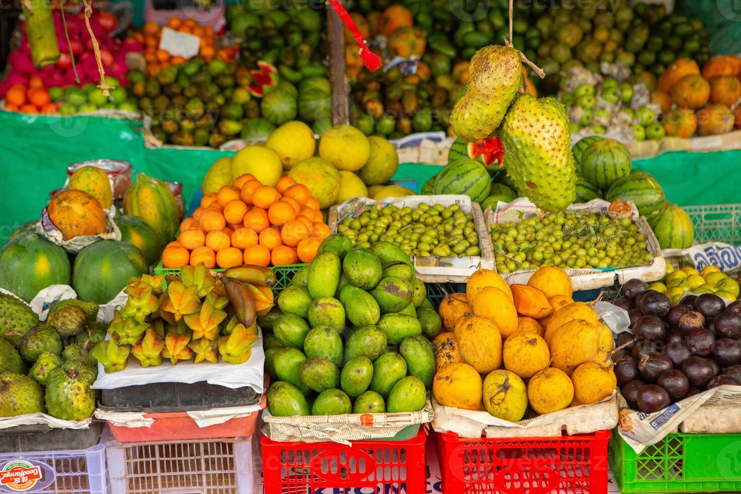fresh seasonal fruits at the market in sri lanka, asia photo