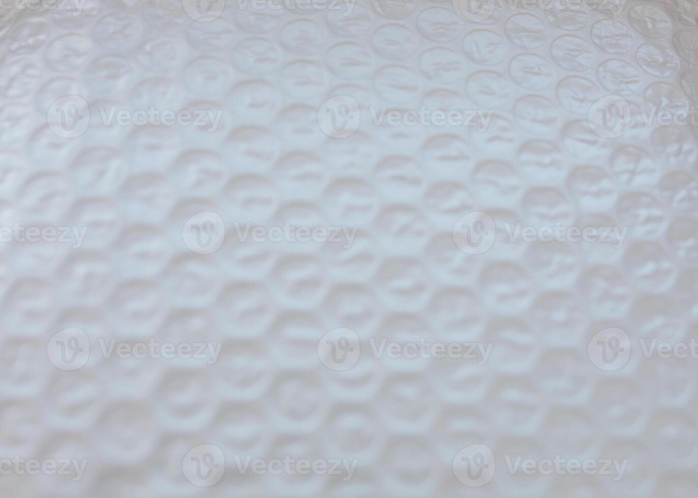 Plastic air bubble protection foil wrap texture background, air bubble packing texture photo