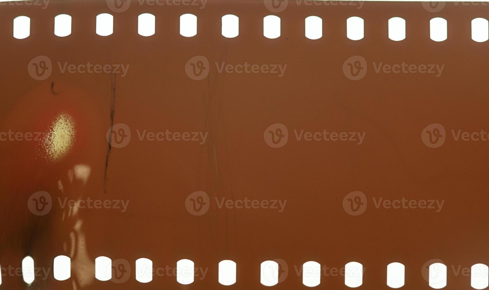 Old burned film frame tape overlay. photo
