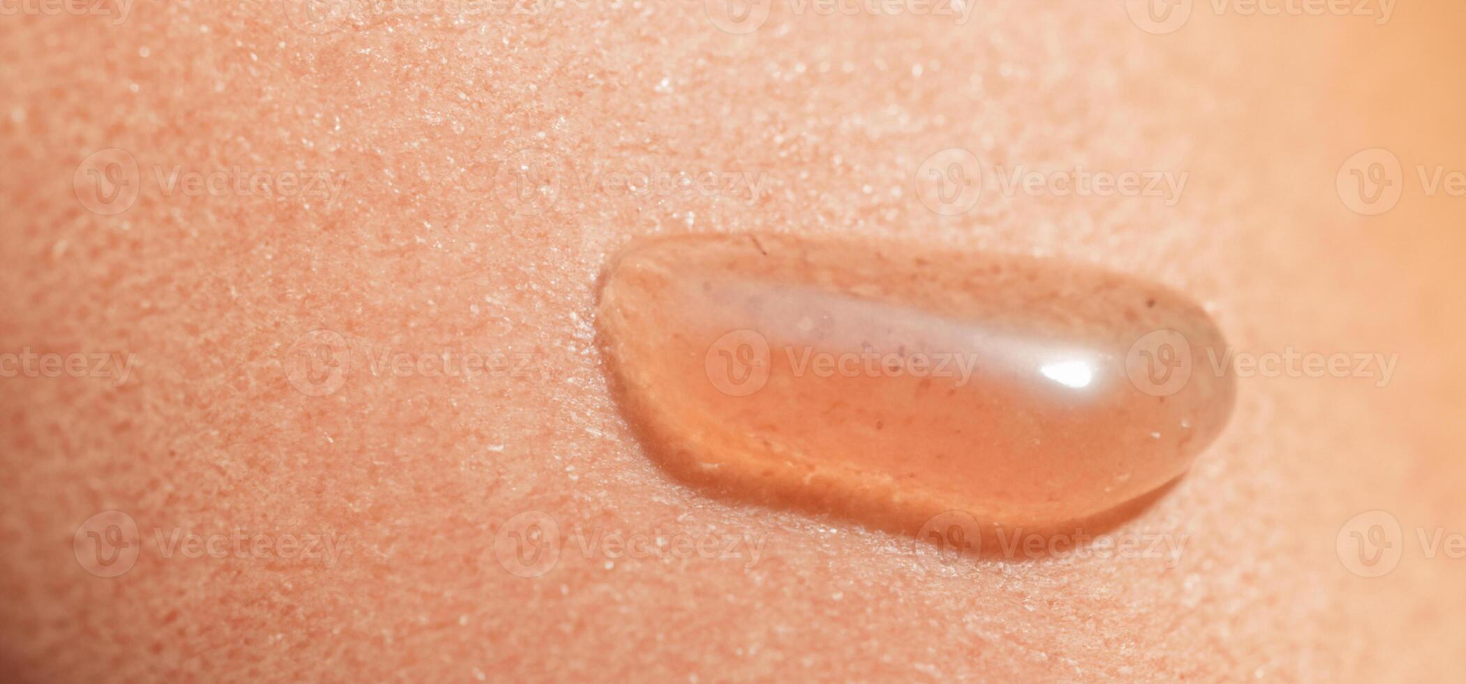 Collagen And Hyaluron Serum Gel On Skin. Splashing of Hyaluron gel photo