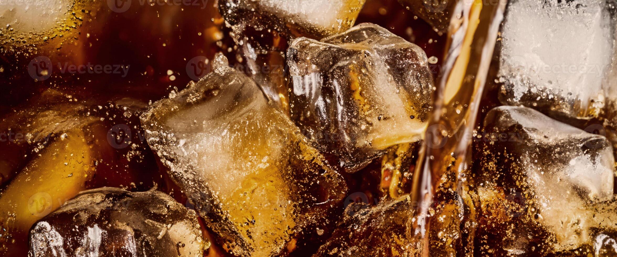 Cola soda ice splashing fizzing or floating up to top of surface photo