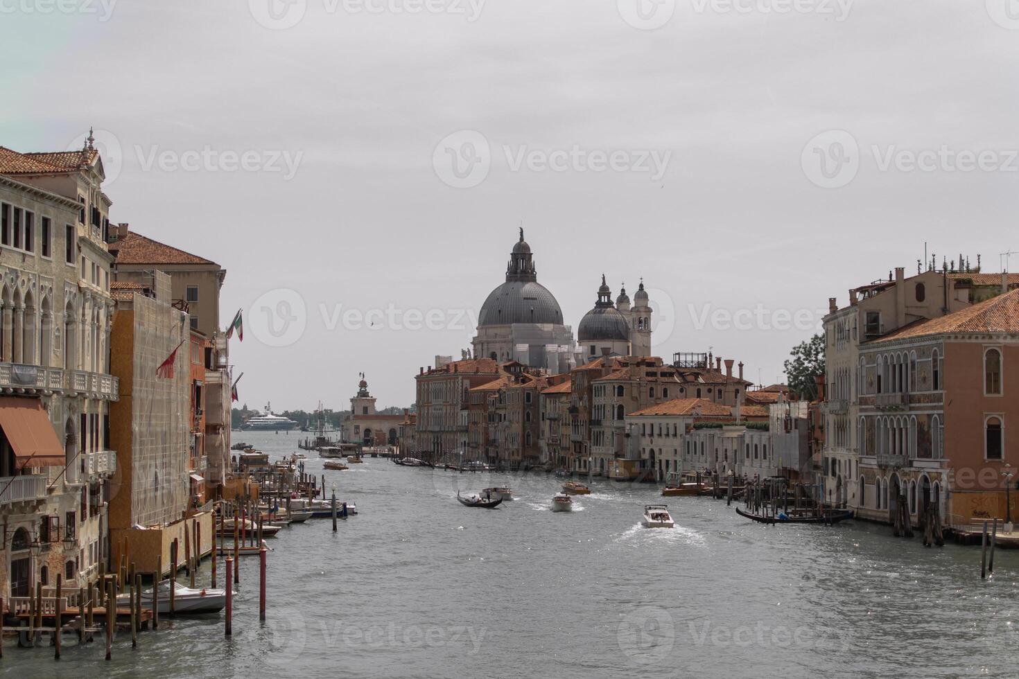 Venice, Italy - 06.16.2022 View of the Grand Canal from one of the city's bridges. photo