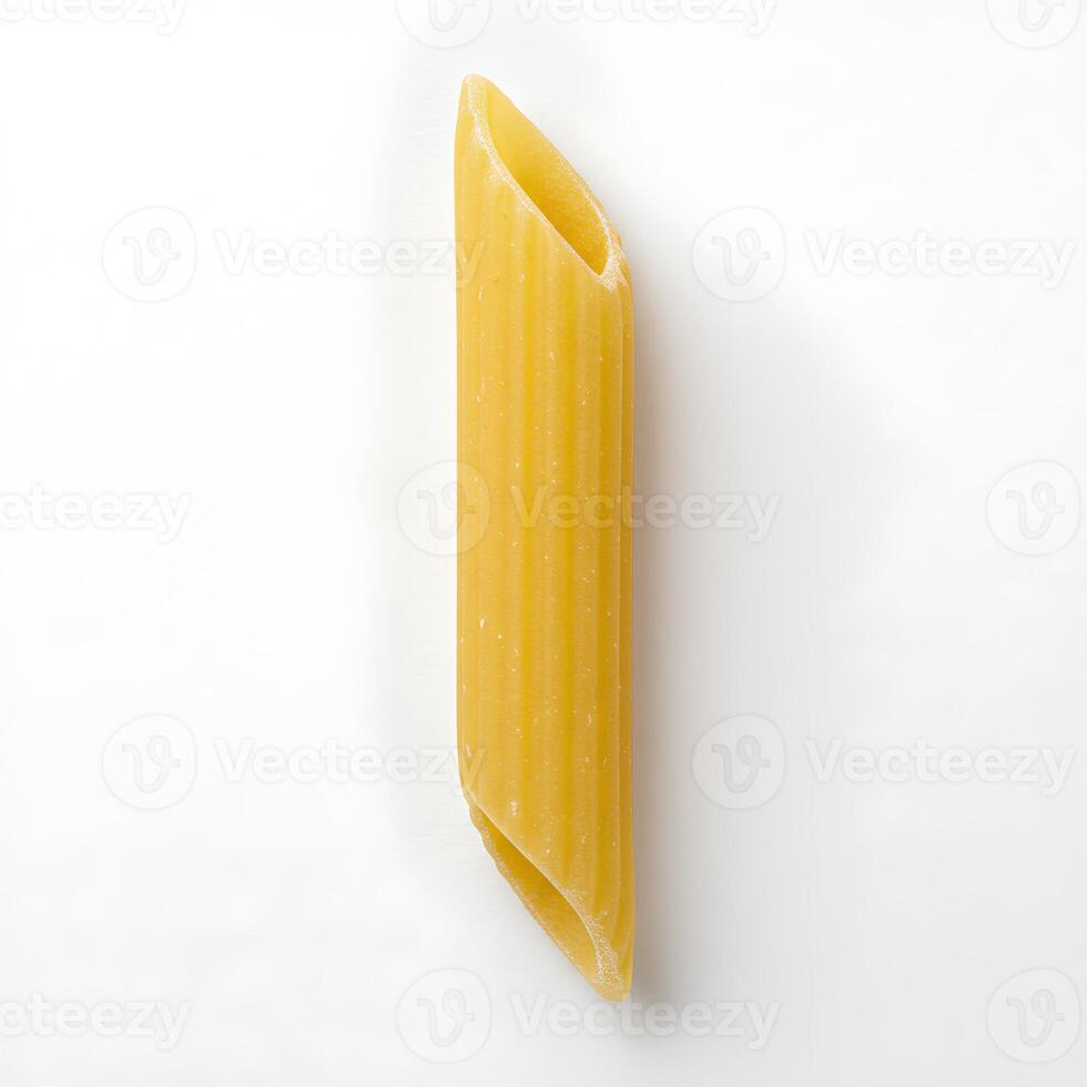 penne pasta isolated on white background, yellow penne pasta as representation of Italian cuisine, culinary experience and food photo