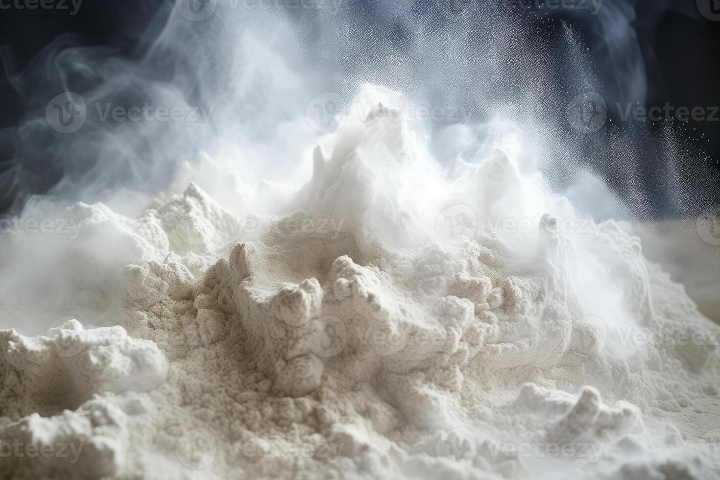 White flour creating a mountain landscape with vapor on a dark background photo