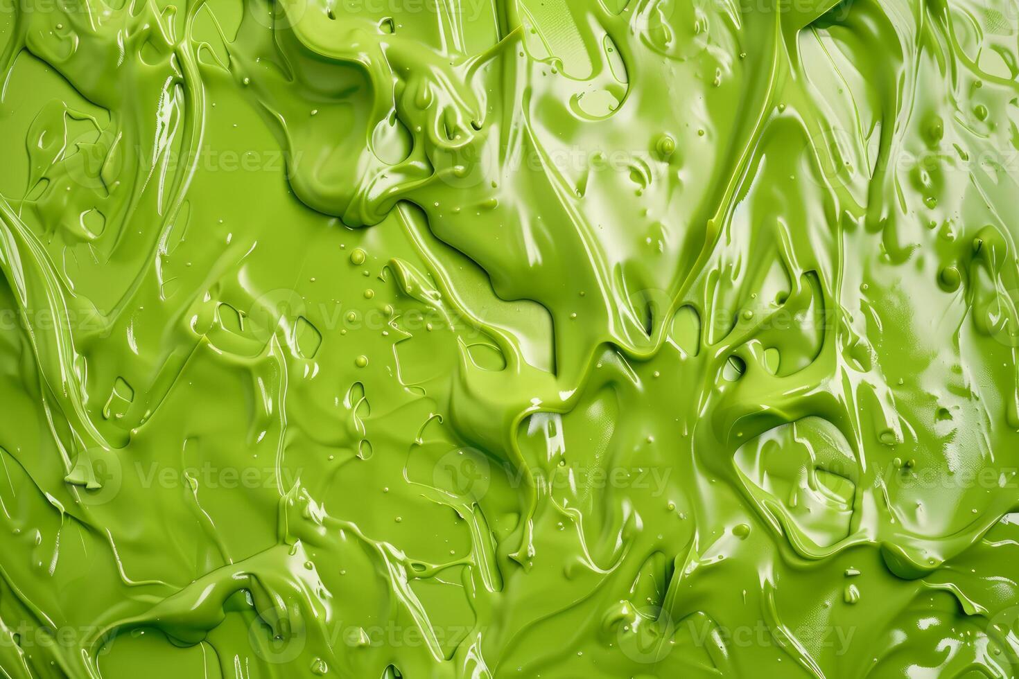 Green cosmetic cream forming a textured background photo