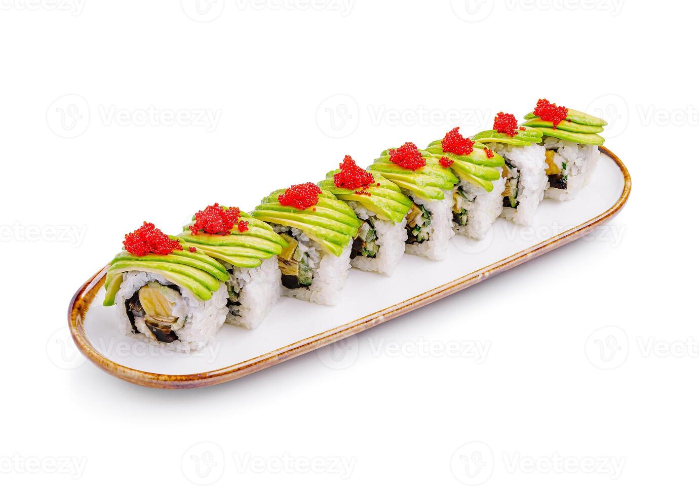 Freshly prepared sushi rolls with avocado and fish roe arranged neatly on a long platter photo