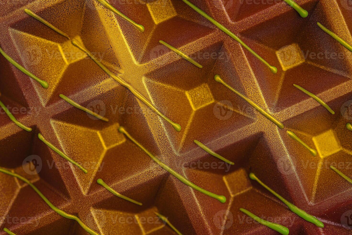 This chocolate mold features a detailed geometric pattern with vibrant colors, ideal for creating high-quality confections photo