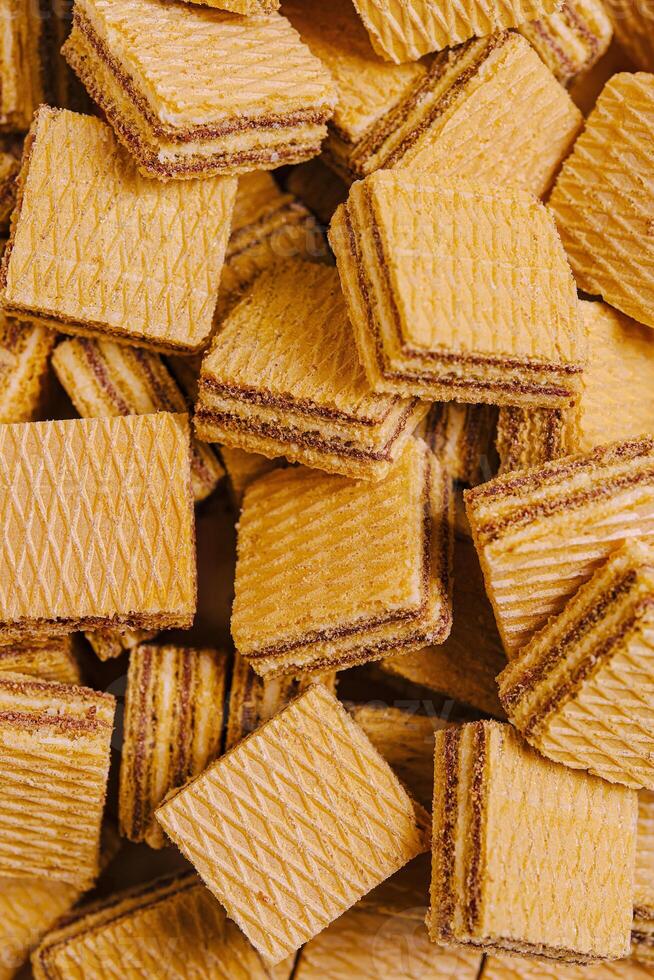 Crispy wafers stacked neatly, showcasing layers and textures in a delightful arrangement photo