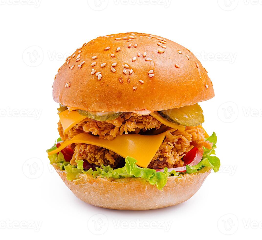 Delicious sesame seed bun sandwich with crispy fried chicken, cheese, and fresh vegetables photo
