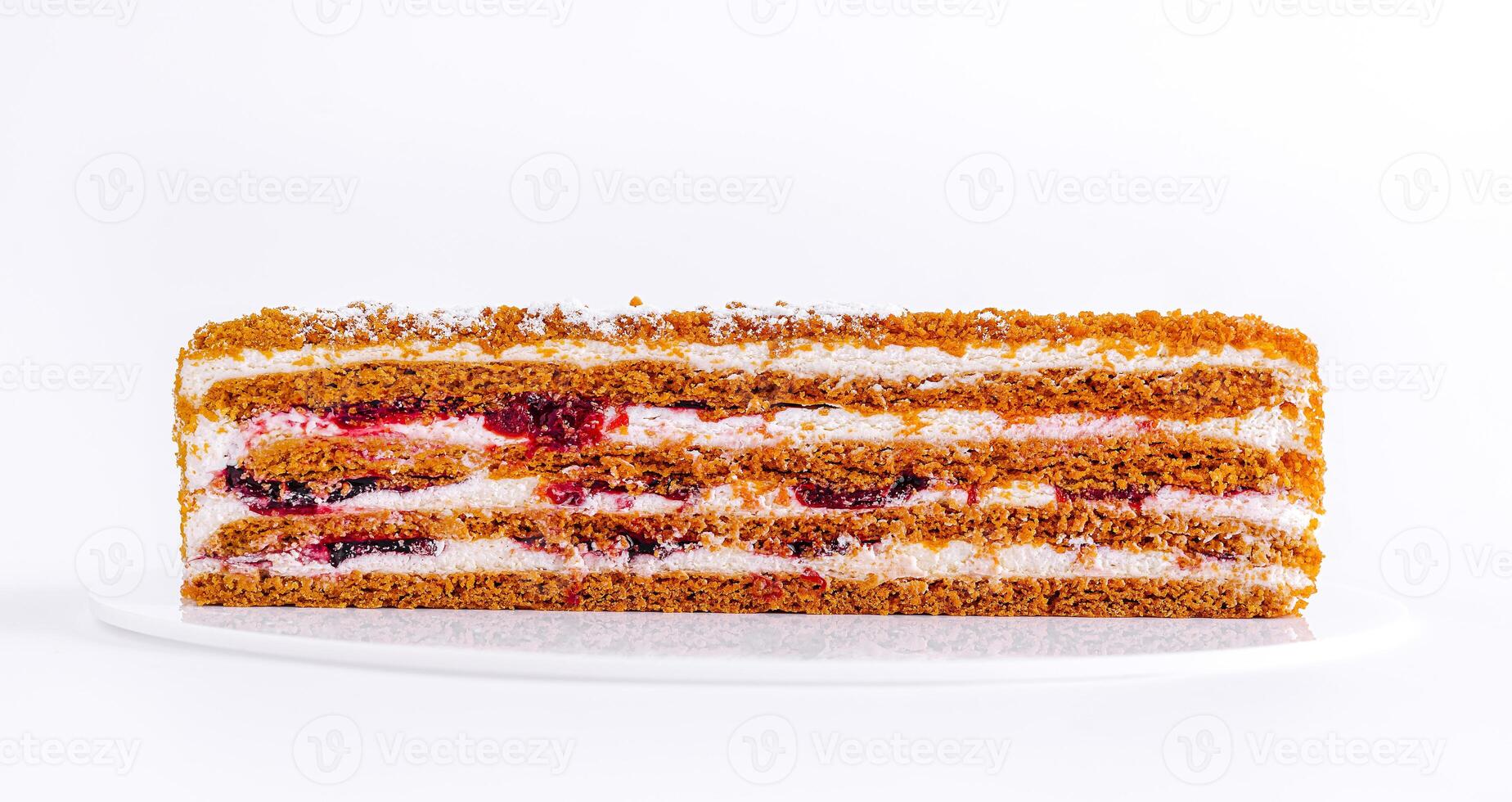 Delicious layered cake with cream and fruit filling, perfect for any celebration or dessert craving photo