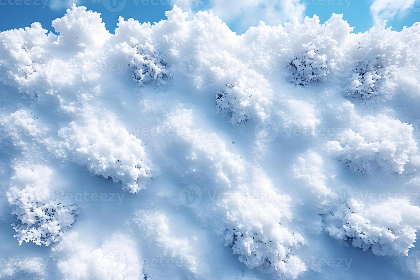 Winter Snowy Landscape with Frosty Snowdrifts Against a Clear Blue Sky photo