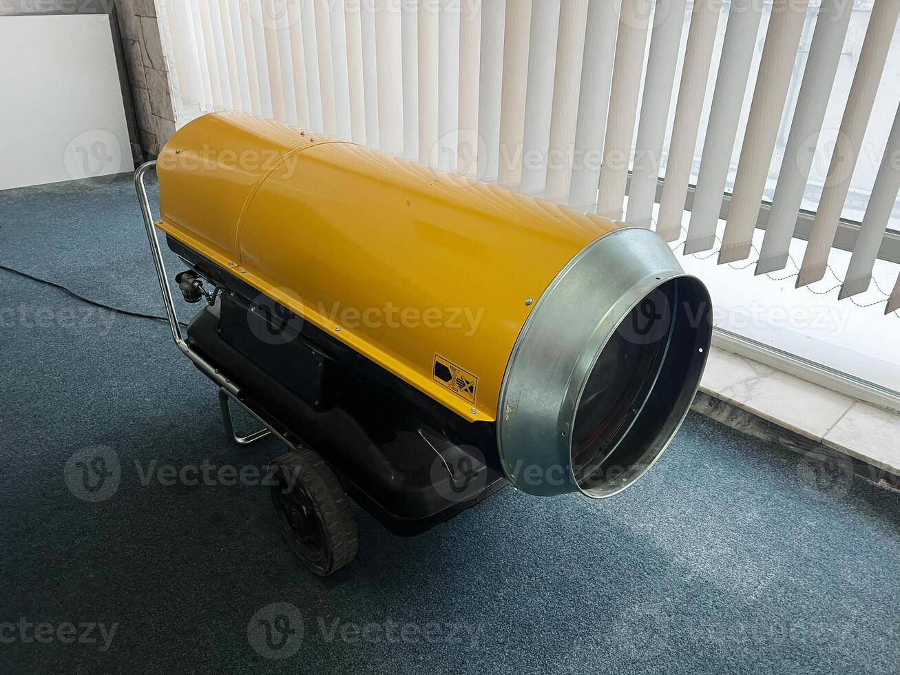 Portable industrial space heater designed for heating large indoor spaces photo