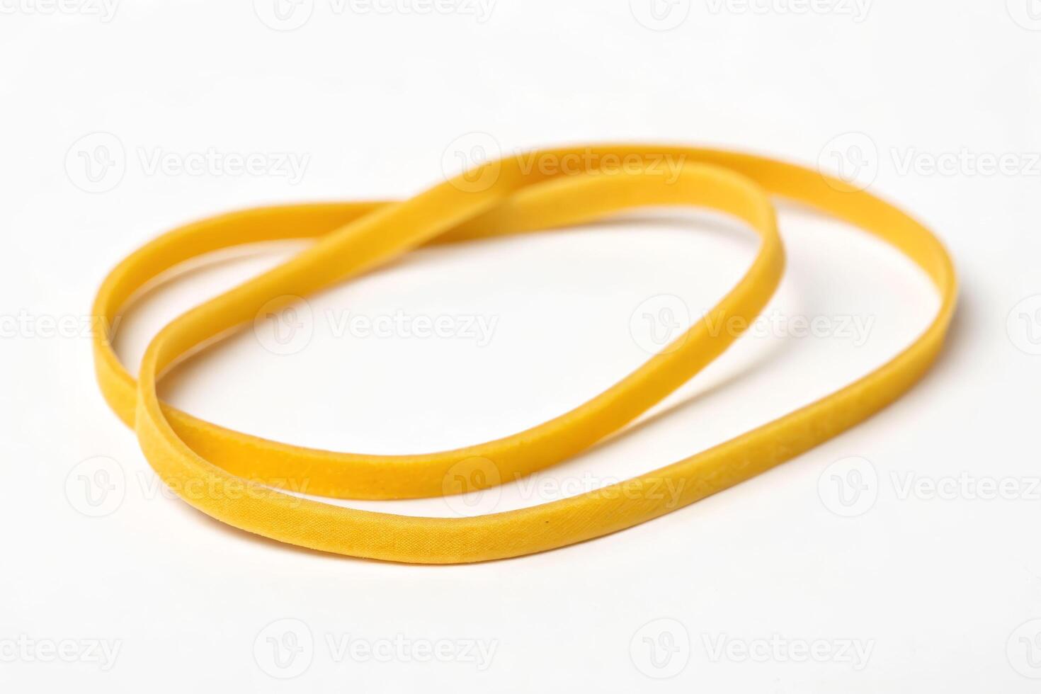 Action of stretching a rubber band isolated on white background material study minimalist environment elevated viewpoint for clarity photo
