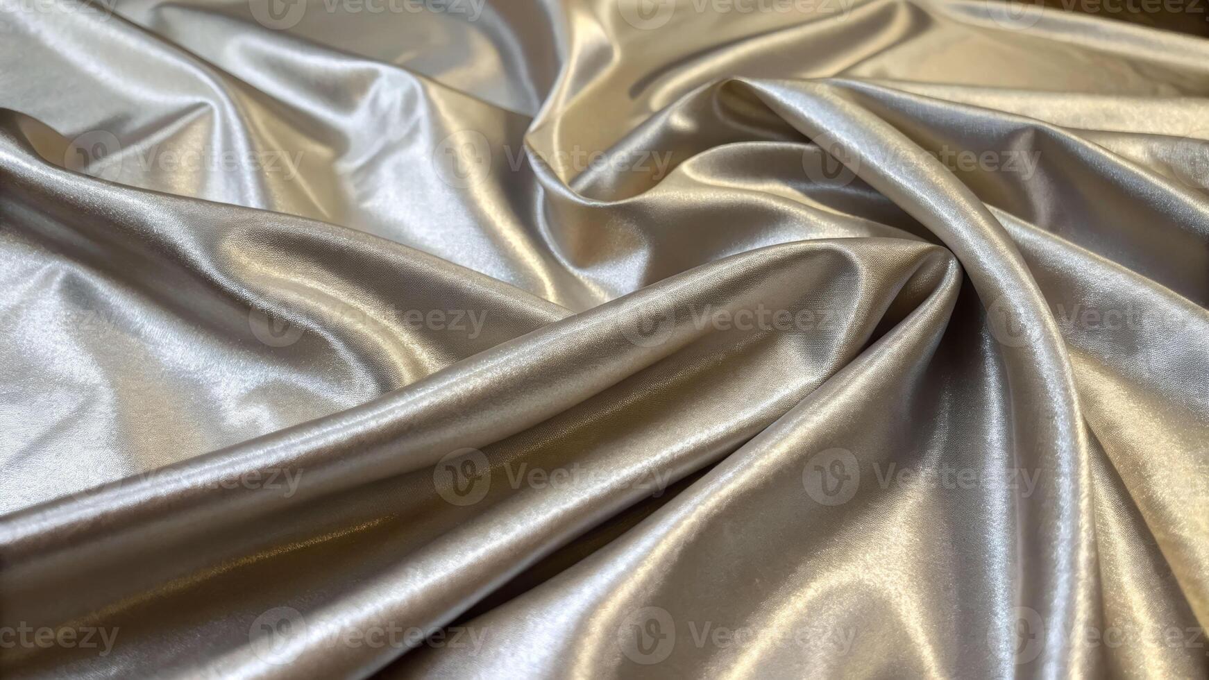 Close-up view of metallic reflective surface material soft fabric texture indoor setting abstract concept photo