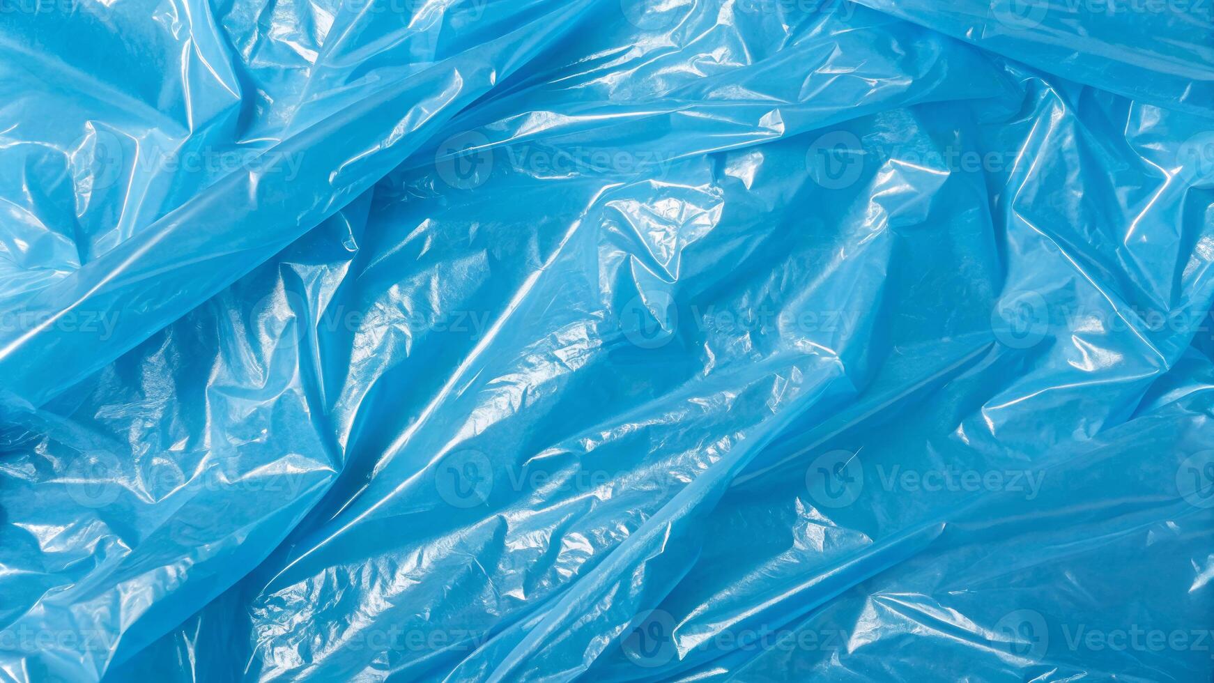 Textured blue wrinkled plastic film material for packaging close-up shot industrial setting abstract viewpoint photo