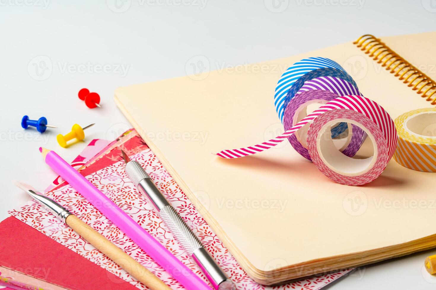 Colorful stationery items on a desk for creative projects and organization in a bright workspace photo