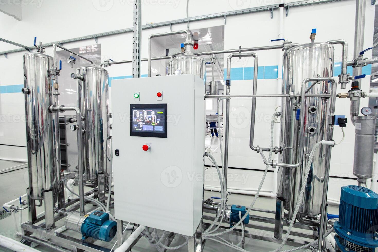 Modern industrial machinery in a clean facility for processing and manufacturing products in an advanced factory setting photo