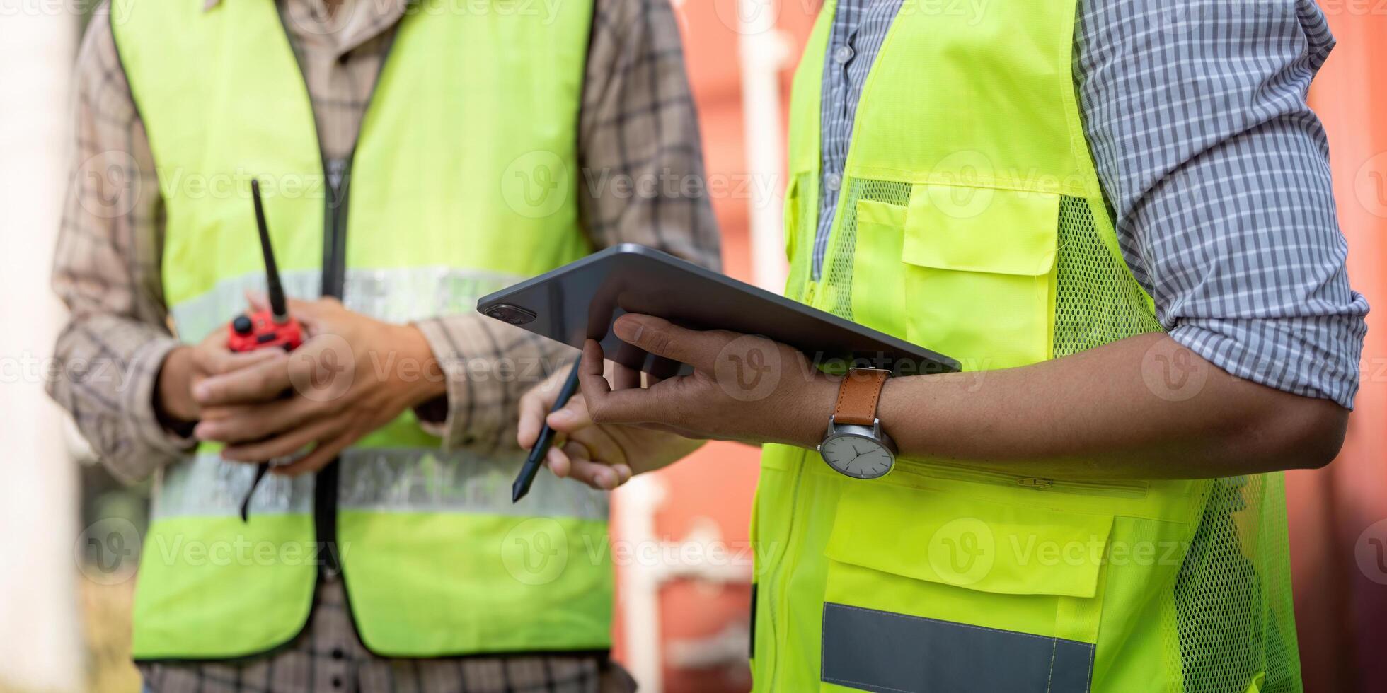 Logistics engineer using a tablet for project management and communication. photo